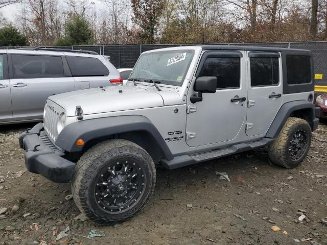 JEEP WRANGLER U 2011 with VIN 1J4HA3H10BL637447 - Photo from auction
