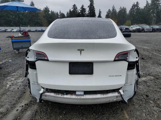 Photo 6 from auction – 2021 TESLA MODEL Y with VIN 5YJYGAEE4MF142836