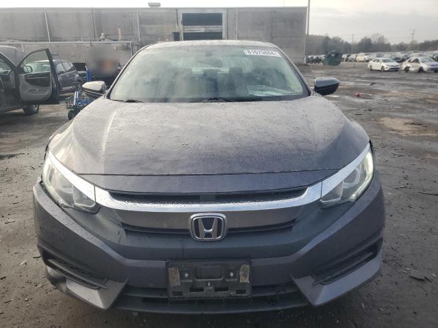 Photo 5 from auction – 2017 HONDA CIVIC LX with VIN 2HGFC2F59HH557921