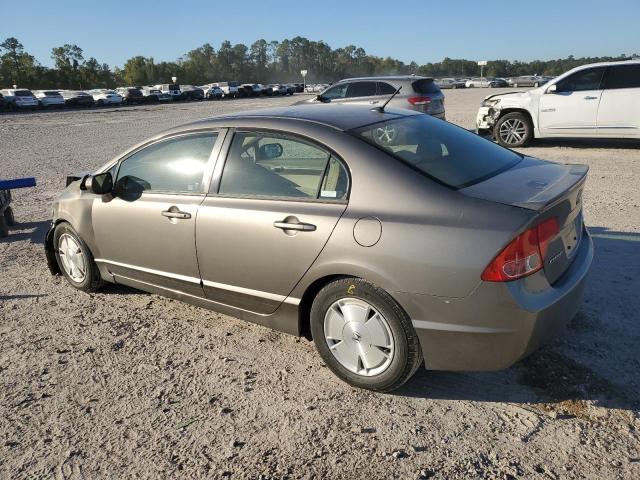 Photo 2 from auction – 2006 HONDA CIVIC HYBR with VIN JHMFA36286S020560