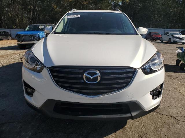 Photo 5 from auction – 2016 MAZDA CX-5 GT with VIN JM3KE2DY8G0815358