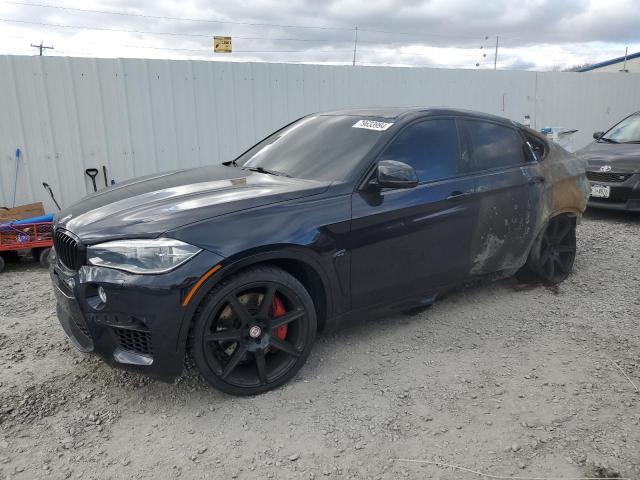 BMW X6 M 2015 with VIN 5YMKW8C54F0G93980 - Photo from auction