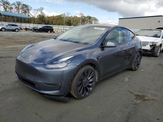TESLA MODEL Y 2023 with VIN 7SAYGDEF3PF944182 - Photo from auction
