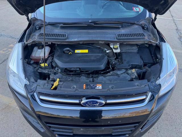 Photo 7 from auction – 2016 FORD ESCAPE TIT with VIN 1FMCU9JX9GUC84972