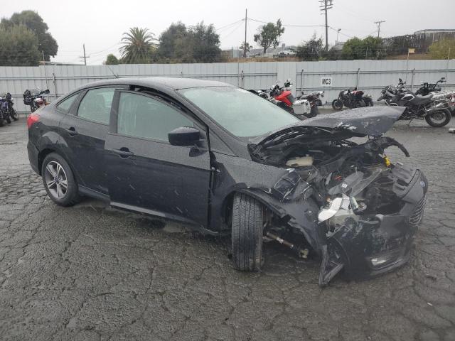 Photo 4 from auction – 2018 FORD FOCUS SE with VIN 1FADP3FE9JL249355