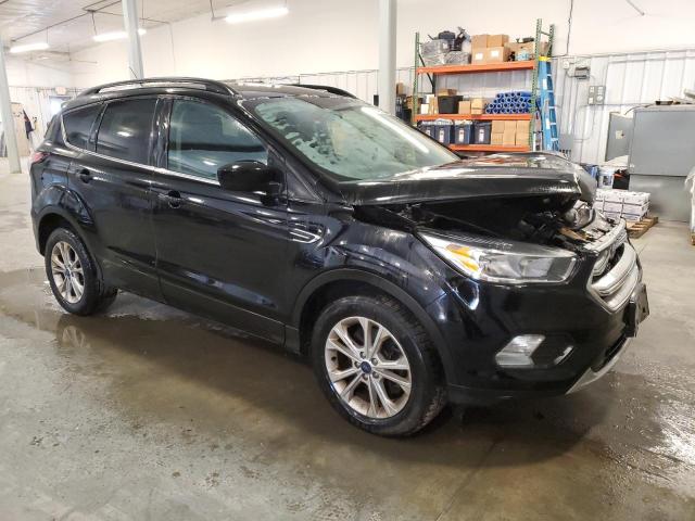 Photo 4 from auction – 2018 FORD ESCAPE SE with VIN 1FMCU9GD4JUC40463