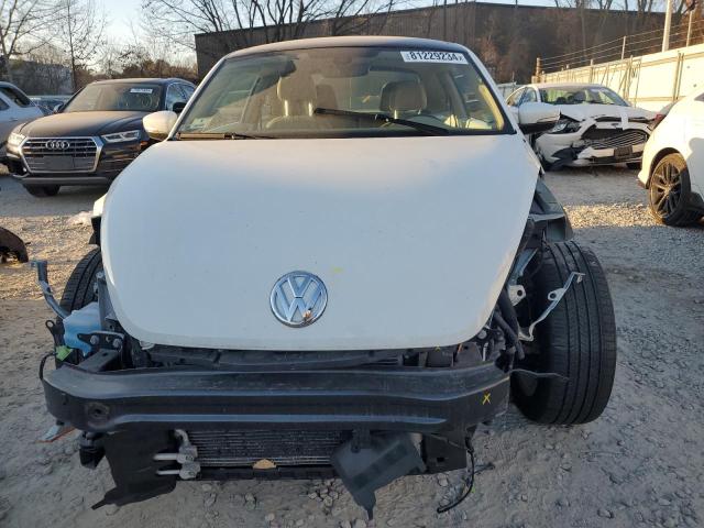 Photo 5 from auction – 2019 VOLKSWAGEN BEETLE SE with VIN 3VWJD7AT2KM720701