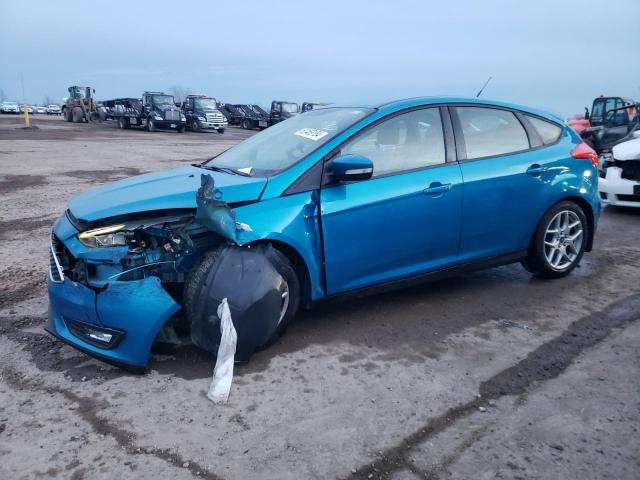 FORD FOCUS SE 2015 with VIN 1FADP3K22FL312573 - Photo from auction