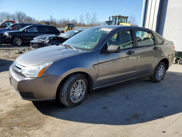 FORD FOCUS 4D 2011 with VIN 1FAHP3FN0BW104917 - Photo from auction