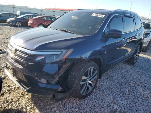 HONDA PILOT ELIT 2017 with VIN 5FNYF6H07HB056068 - Photo from auction