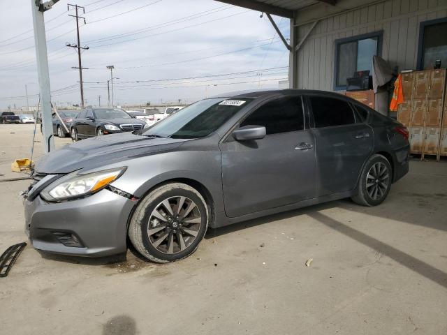 NISSAN ALTIMA 2.5 2018 with VIN 1N4AL3AP7JC203966 - Photo from auction