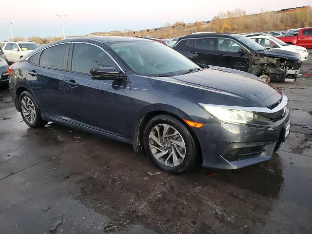 Photo 4 from auction – 2018 HONDA CIVIC EX with VIN 2HGFC2F79JH551995