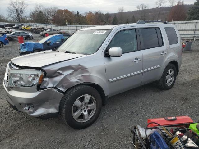 HONDA PILOT EXL 2011 with VIN 5FNYF4H52BB105085 - Photo from auction