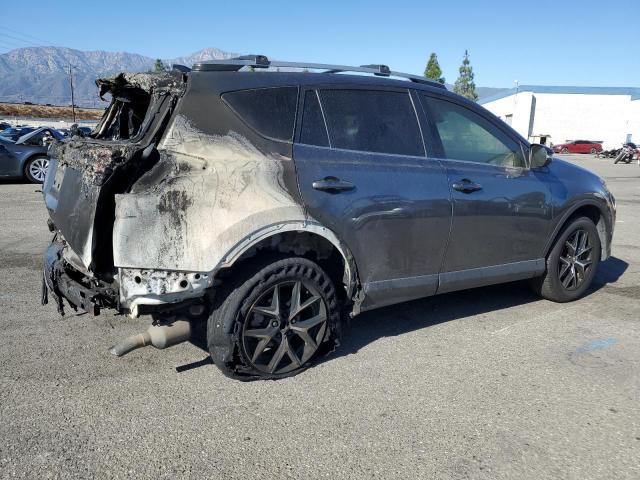 Photo 3 from auction – 2018 TOYOTA RAV4 SE with VIN JTMNFREV3JD127915