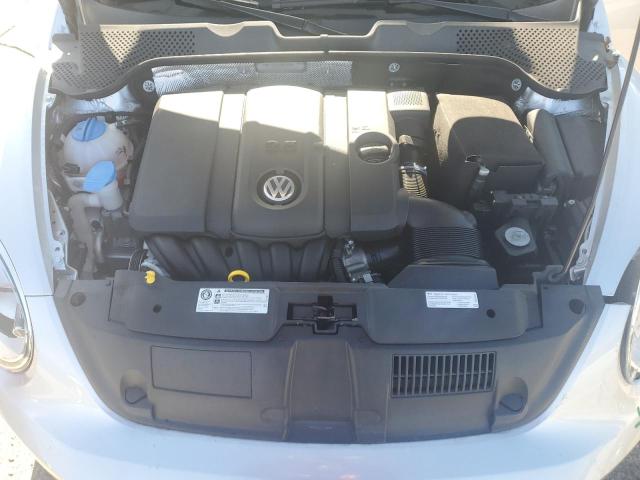 Photo 11 from auction – 2014 VOLKSWAGEN BEETLE with VIN 3VWFP7AT2EM629462