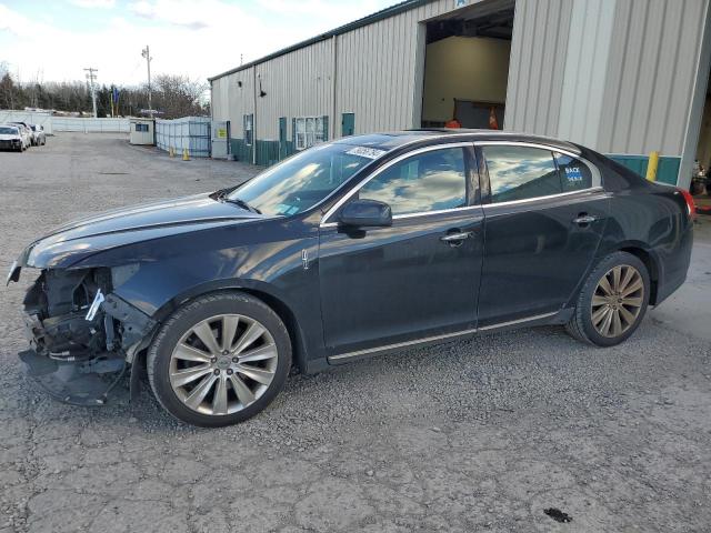 LINCOLN MKS 2015 with VIN 1LNHL9FTXFG607793 - Photo from auction