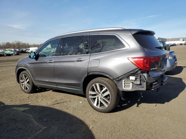 Photo 2 from auction – 2018 HONDA PILOT ELIT with VIN 5FNYF6H04JB049598