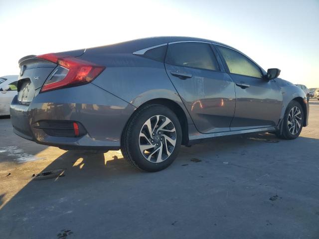 Photo 3 from auction – 2018 HONDA CIVIC LX with VIN 2HGFC2F60JH043180