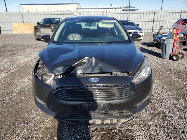 Photo 5 from auction – 2015 FORD FOCUS SE with VIN 1FADP3K27FL359100