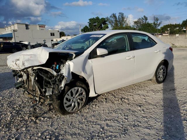 TOYOTA COROLLA L 2019 with VIN 5YFBURHE4KP907585 - Photo from auction