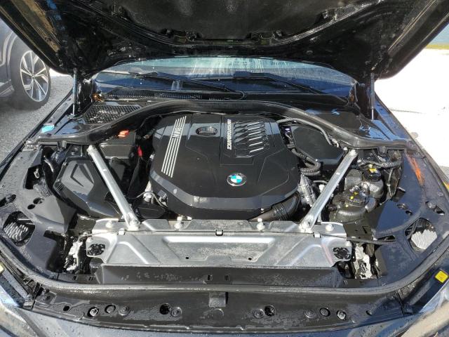 Photo 11 from auction – 2022 BMW M440I with VIN WBA83AP05NCJ52588