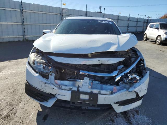 Photo 5 from auction – 2018 HONDA CIVIC EX with VIN 19XFC2F77JE202697