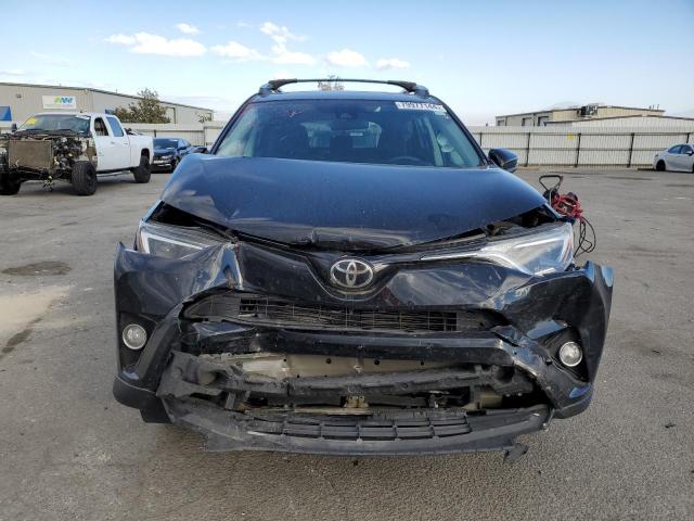 Photo 5 from auction – 2017 TOYOTA RAV4 XLE with VIN 2T3RFREV3HW676948