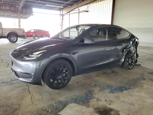 TESLA MODEL Y 2021 with VIN 5YJYGAEE4MF306439 - Photo from auction