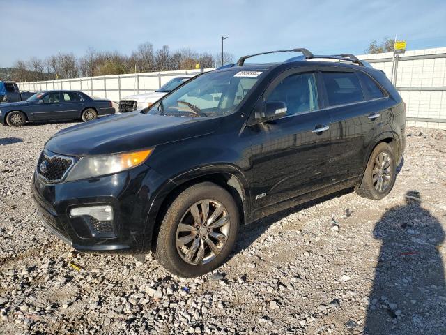 KIA SORENTO SX 2013 with VIN 5XYKWDA25DG414079 - Photo from auction