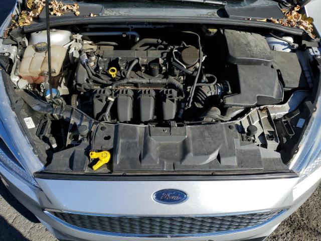 Photo 11 from auction – 2016 FORD FOCUS SE with VIN 1FADP3F27GL300415