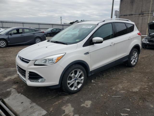 FORD ESCAPE TIT 2016 with VIN 1FMCU0JX6GUA36982 - Photo from auction