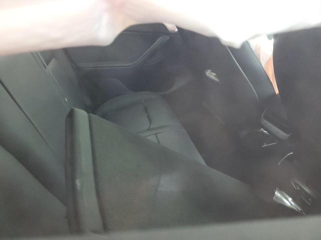 Photo 10 from auction – 2023 TESLA MODEL Y with VIN 7SAYGDEE6PA034305