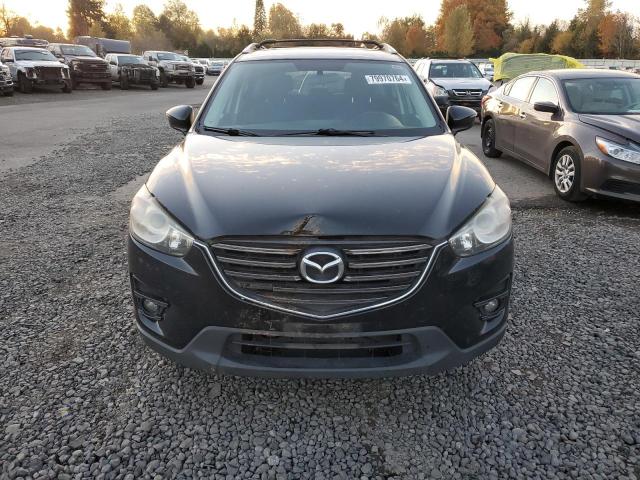 Photo 5 from auction – 2016 MAZDA CX-5 TOURI with VIN JM3KE4CY1G0667065