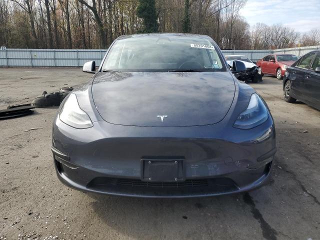 Photo 5 from auction – 2023 TESLA MODEL Y with VIN 7SAYGDEE3PA203079