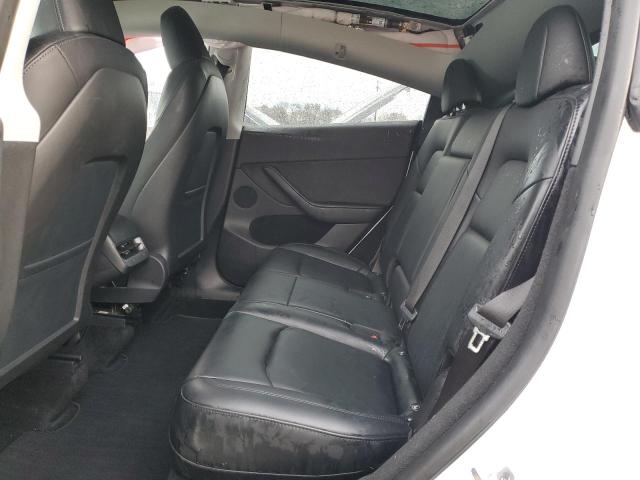 Photo 11 from auction – 2022 TESLA MODEL Y with VIN 7SAYGDEE6NA019848