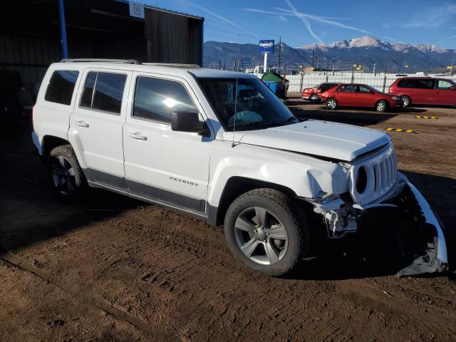 Photo 4 from auction – 2014 JEEP PATRIOT LA with VIN 1C4NJPFA2ED859411