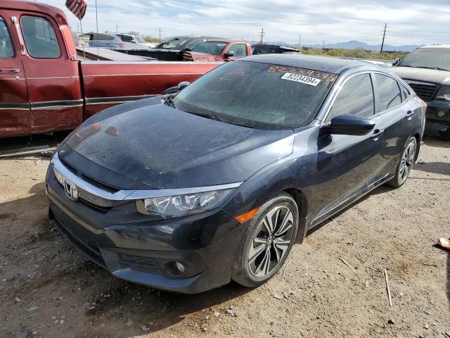 HONDA CIVIC EXL 2018 with VIN JHMFC1F75JX023745 - Photo from auction