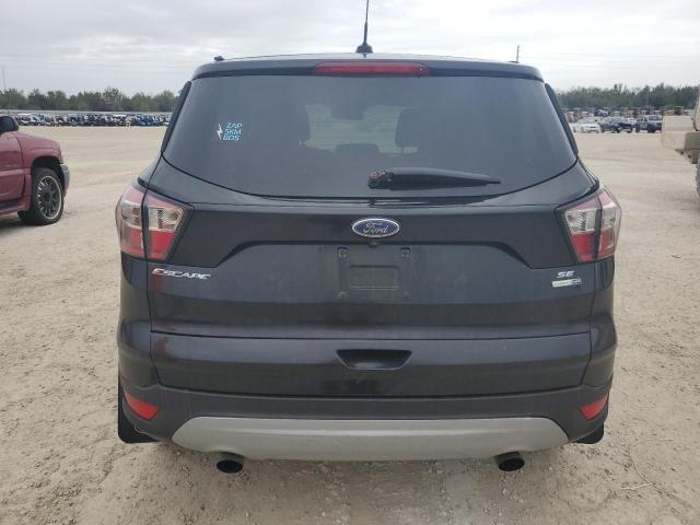 Photo 6 from auction – 2017 FORD ESCAPE SE with VIN 1FMCU9GD4HUC70234