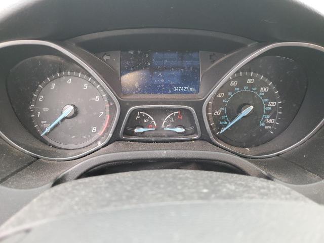 Photo 9 from auction – 2014 FORD FOCUS SE with VIN 1FADP3F28EL293648