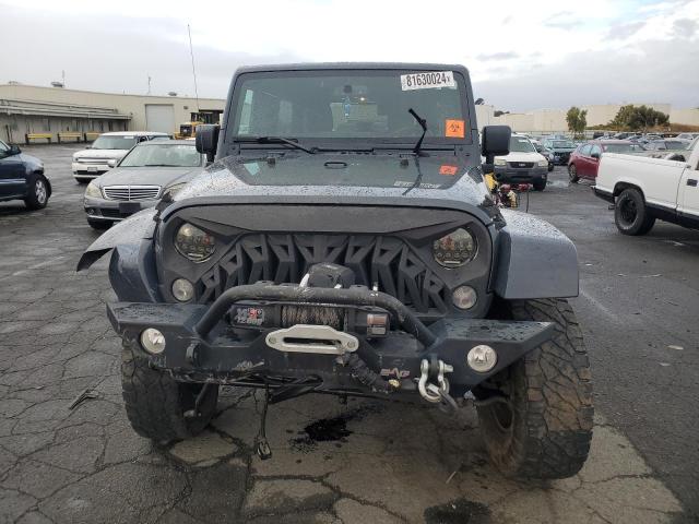 Photo 5 from auction – 2016 JEEP WRANGLER U with VIN 1C4HJWFG7GL271167