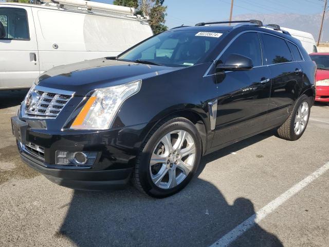 CADILLAC SRX PREMIU 2014 with VIN 3GYFNDE31ES661066 - Photo from auction