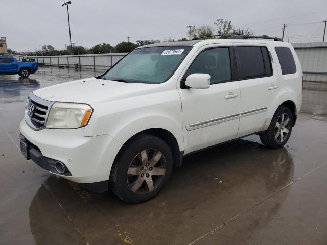 HONDA PILOT TOUR 2013 with VIN 5FNYF4H96DB023169 - Photo from auction