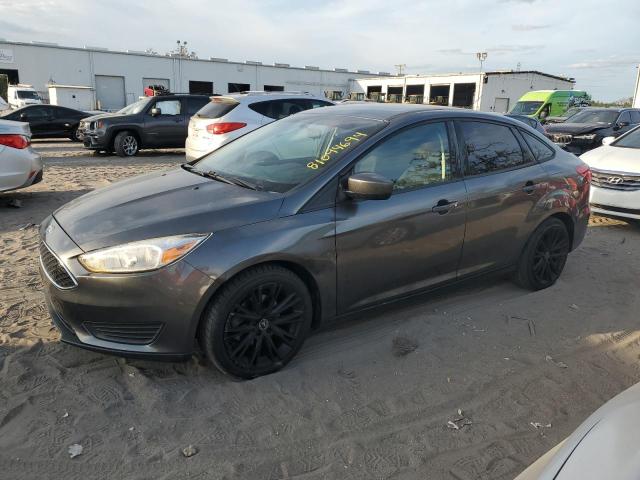 FORD FOCUS SE 2018 with VIN 1FADP3FE4JL329761 - Photo from auction