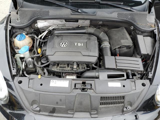 Photo 11 from auction – 2014 VOLKSWAGEN BEETLE with VIN 3VWJ17AT3EM666743
