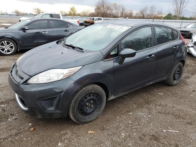 FORD FIESTA SE 2011 with VIN 3FADP4EJ7BM224779 - Photo from auction