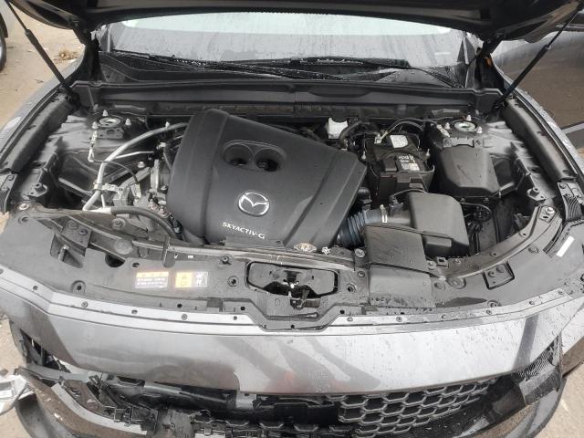 Photo 12 from auction – 2023 MAZDA CX-50 PREF with VIN 7MMVABCM4PN117168
