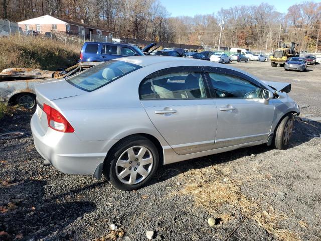 Photo 3 from auction – 2011 HONDA CIVIC LX with VIN 2HGFA1F52BH304222