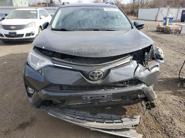 Photo 5 from auction – 2017 TOYOTA RAV4 XLE with VIN 2T3RFREV2HW659378