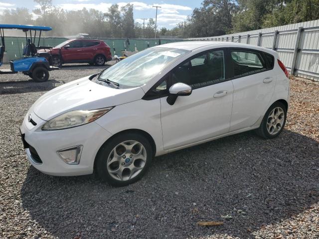 FORD FIESTA SES 2011 with VIN 3FADP4FJ4BM224091 - Photo from auction