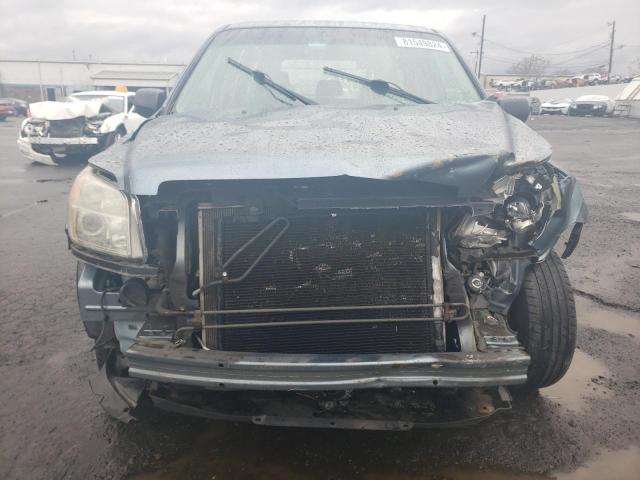 Photo 5 from auction – 2006 HONDA PILOT LX with VIN 2HKYF18116H553837